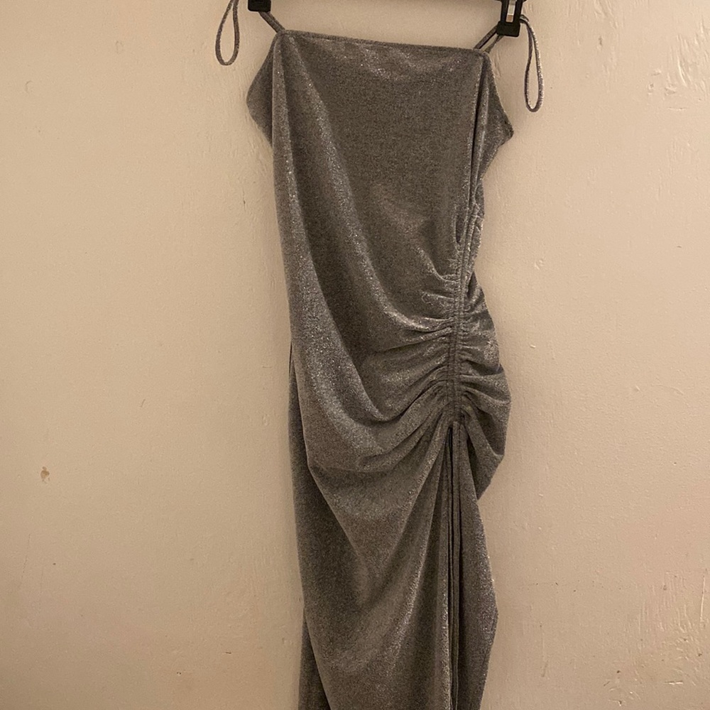 Divided silver sparkle dress, cut on the side